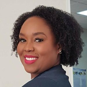 A headshot of Julia, an Office Manager/Jobs Analyst with HRWise, gives a friendly welcoming smile to the camera.